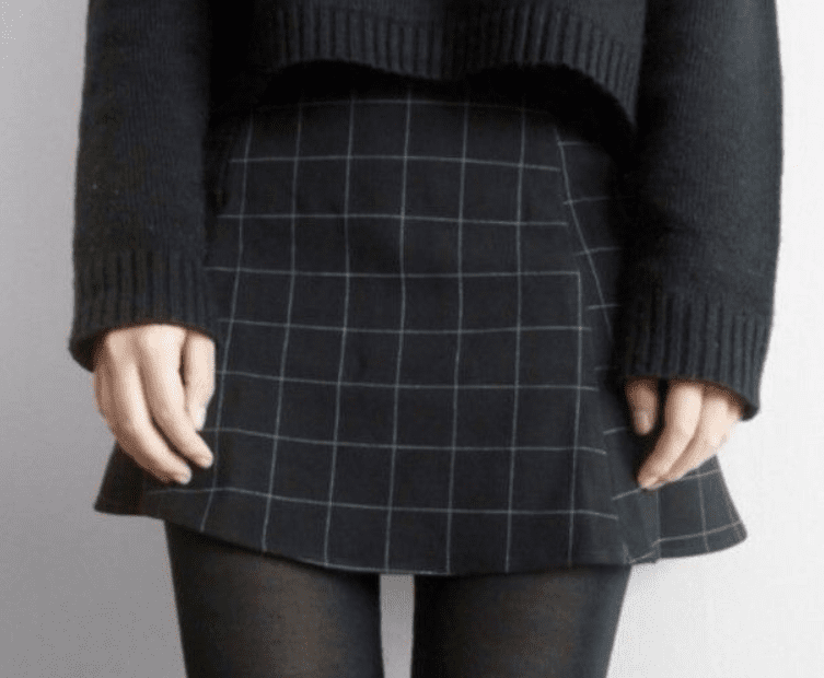 Black t-shirt with a sweater skirt in gray checks